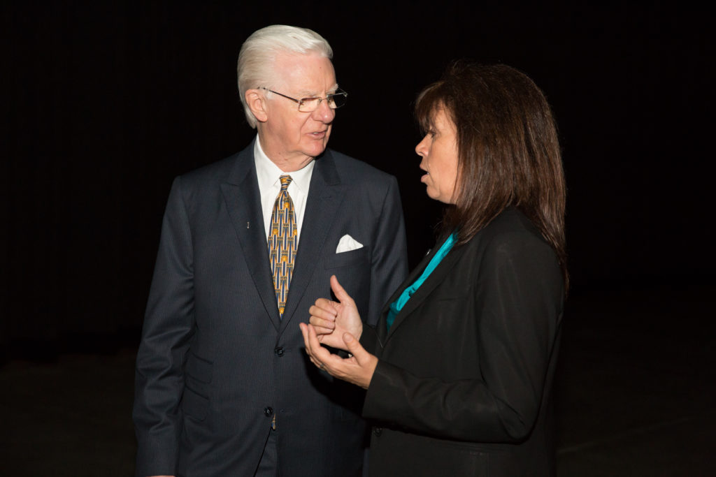 Gail Kingsbury with Bob Proctor backstage discussing his next segment.